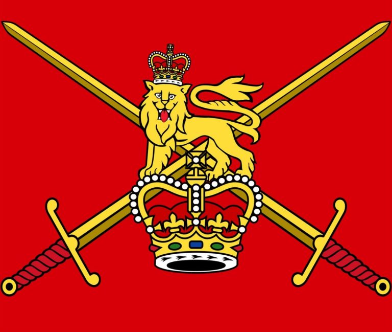 Royal emblem featuring a lion atop a crown and crossed swords on a red background.